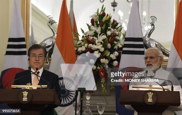 Indian Prime Minister Narendra Modi and South Korean President Moon Jae-in take part in a joint press statement during his official visit in New...