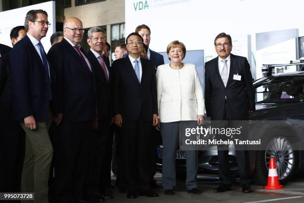 Andreas Scheuer, Minister of Traffic and Infrastructures, Peter Altmaier, Minister of Economy, Bernhard Mattes VDA President German Chancellor Angela...