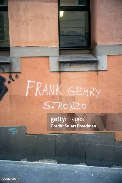 Satirical graffiti outside the Faculty of Architecture, Genoa University that reads in translation 'Frank Gehry is shit', Genoa, Italy.