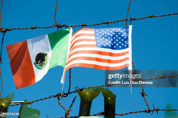 the wall of shame - mexico v united states stock pictures, royalty-free photos & images