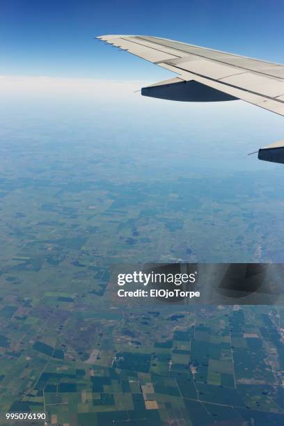 flying over argentina, view from window airplane - tranquilizing stock pictures, royalty-free photos & images