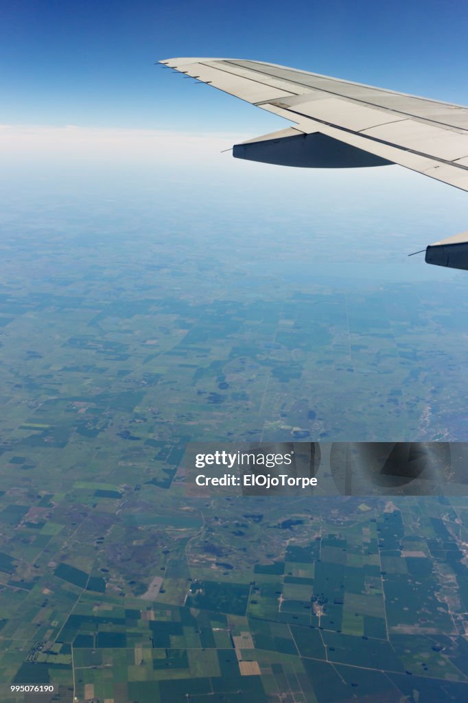 Flying over Argentina, view from window airplane
