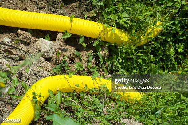 street humanizing, yellow pipes - trench safety stock pictures, royalty-free photos & images