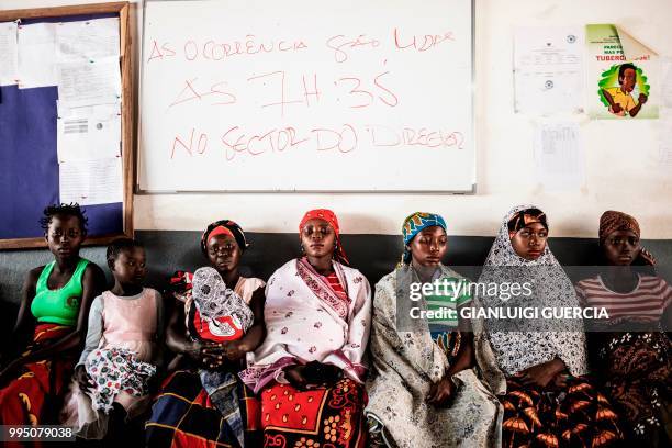 Mozambican women and expecting mothers await to receive medical care at the Murrupelane Maternity ward on July 5, 2018 in Nacala, Nampula Province,...