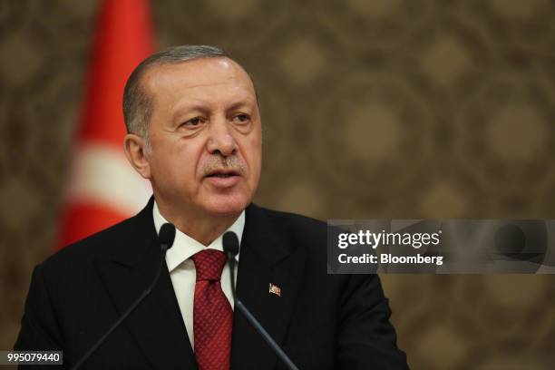 Recep Tayyip Erdogan, Turkey's president, announces members of his cabinet during a news conference at the Presidential palace in Ankara, Turkey, on...