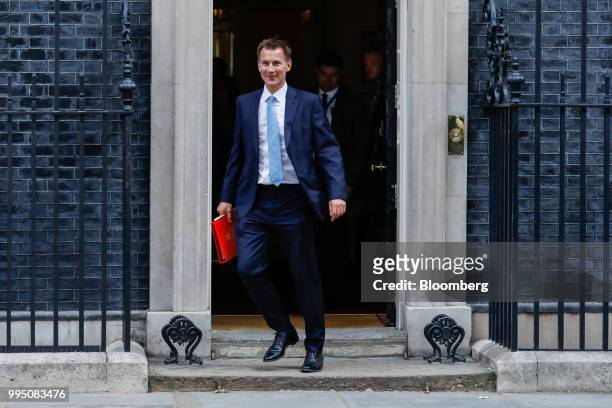 Jeremy Hunt, U.K. Foreign secretary, departs from a weekly meeting of cabinet ministers at number 10 Downing Street in London, U.K., on Tuesday, July...