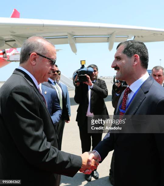 Turkish President Recep Tayyip Erdogan is being welcomed by Turkish Ambassador to Baku Erkan Ozoral as he arrives with the private plane called "TUR"...