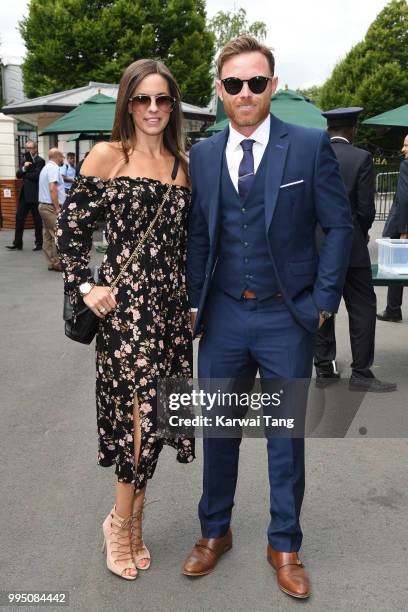 Ian Bell and his wife Chantal Louise Bastock attend day eight of the Wimbledon Tennis Championships at the All England Lawn Tennis and Croquet Club...