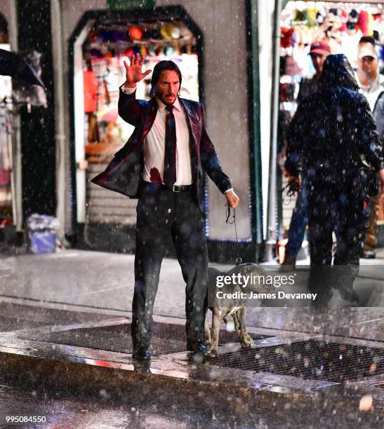 Keanu Reeves seen on location for 'John Wick 3' near Times Square on July 9, 2018 in New York City.