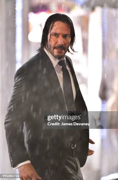 Keanu Reeves seen on location for 'John Wick 3' near Times Square on July 9, 2018 in New York City.