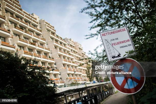 Sign reads "Rettungswege für die Feuerwehr freihalten" outside the Hannibal Hochhauskomplex high-rise building complex in Dortmund, Germany, 21...