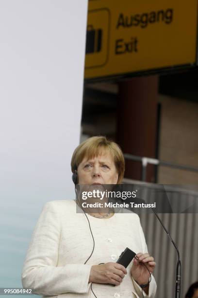 German Chancellor Angela Merkel attends an event to present a project on autonomous driving at former Tempelhof airport on July 10, 2018 in Berlin,...