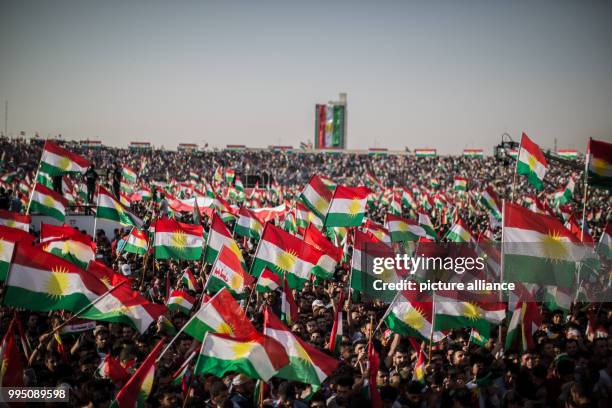 Dpatop - People listen to a speech of Kurdish President Masoud Barzani during a rally for an independent Kurdistan in Erbil, Iraq, 22 September 2017....