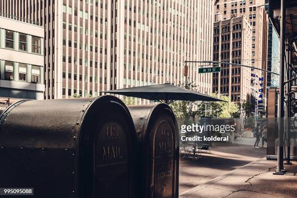 us mail boxes on sixth avenue in midtown manhattan - sixth avenue foto e immagini stock