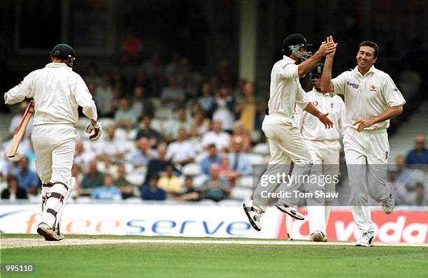 Glenn McGrath of Australia celebrates the wicket of Michael Atherton of England during the 4th day of the 5th Ashes Test between England and...