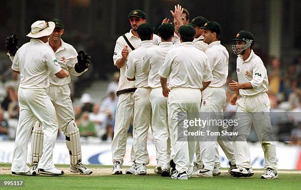 Australia celebrate the wicket of Michael Atherton of England during the 4th day of the 5th Ashes Test between England and Australia at The AMP Oval,...
