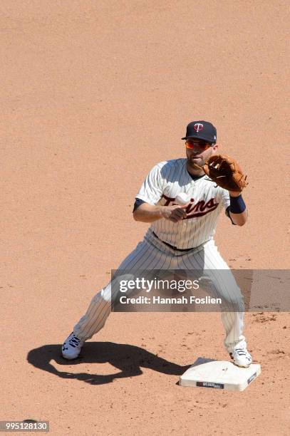 Brian Dozier of the Minnesota Twins makes a play at second base against the Baltimore Orioles during the game on July 7, 2018 at Target Field in...