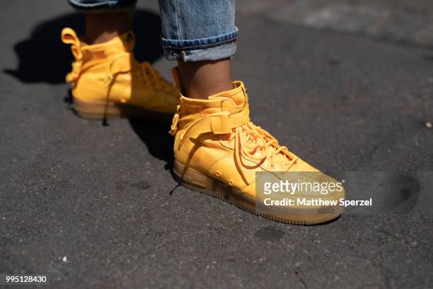 Hannah Stoudemire is seen on the street attending Men's New York Fashion Week wearing vintage Levis jacket, Gap jeans and OBJ Air Force shoes on July...