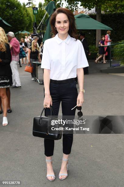 Michelle Dockery attends day eight of the Wimbledon Tennis Championships at the All England Lawn Tennis and Croquet Club on July 10, 2018 in London,...