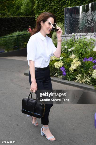 Michelle Dockery attends day eight of the Wimbledon Tennis Championships at the All England Lawn Tennis and Croquet Club on July 10, 2018 in London,...