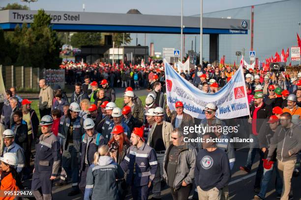 Employees of Thyssenkrupp participate in a protest organised by the worker's council and the IG Metall union in Bochum, Germany, 22 September 2017....