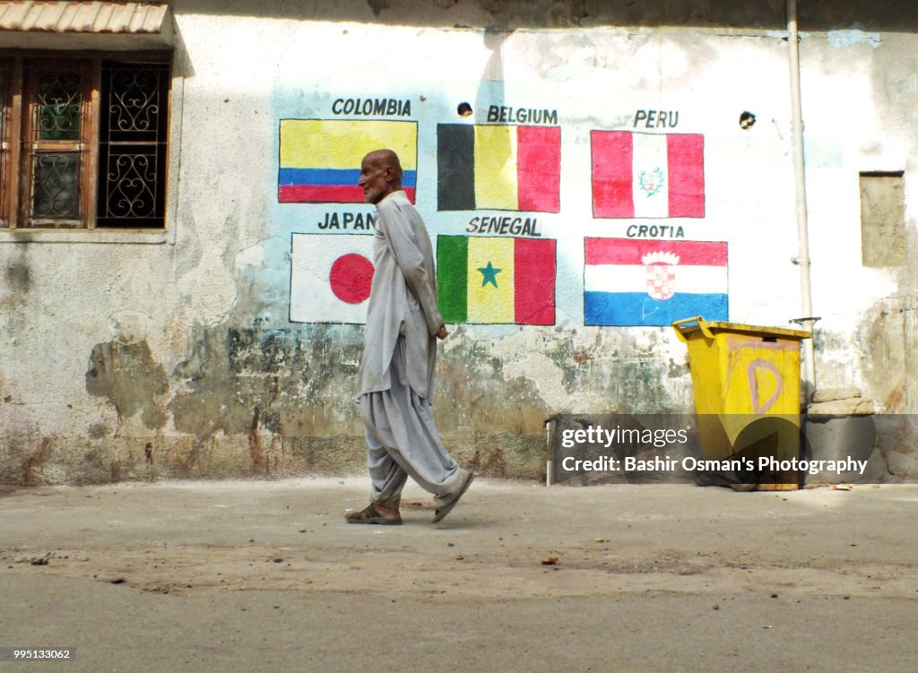 The street walls painted with flags of different countries
