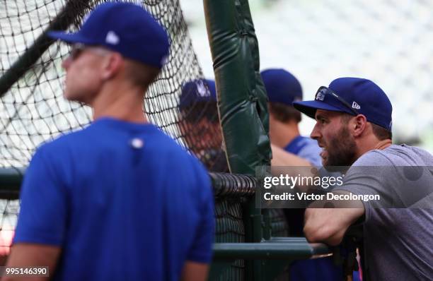 Chris Taylor of the Los Angeles Dodgers watches batting practice prior to the MLB game at Angel Stadium on July 6, 2018 in Anaheim, California. The...