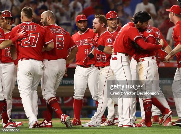 Martin Maldonado, Mike Trout, Albert Pujols, Luis Valbuena, Kole Calhoun, Jose Briceno, Shohei Ohtani, Justin Upton and their Los Angeles Angels of...