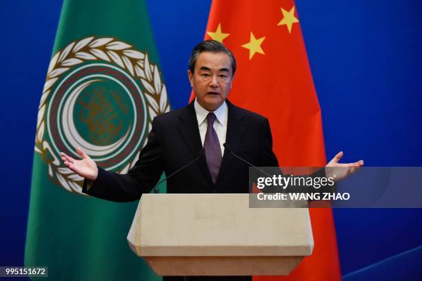 Chinese Foreign Minister Wang Yi gives a speech at a press conference during the 8th Ministerial Meeting of China-Arab States Cooperation Forum at...