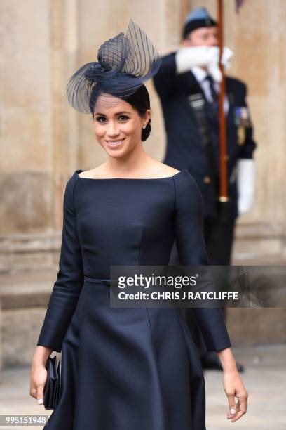Britain's Meghan, Duchess of Sussex leaves a service to mark the centenary of the Royal Air Force at Westminster Abbey in central London on July 10,...