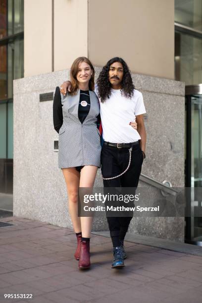 Paige Bitner and Yaya Outlaw are seen on the street attending Men's New York Fashion Week wearing Craig Green, Comme des Garcon, PS Kaufman on July...