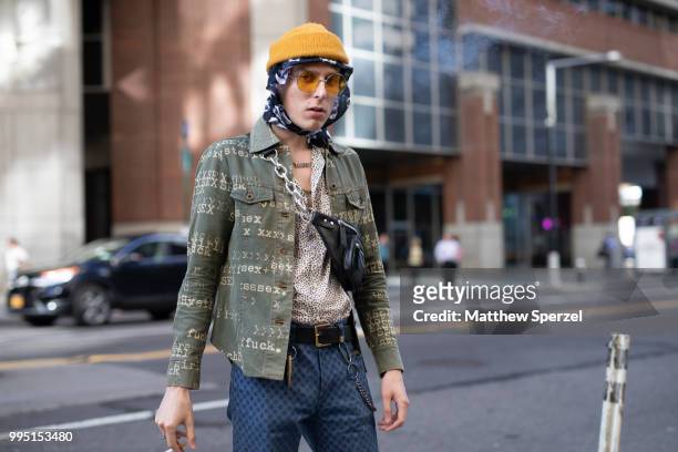 John Dunham is seen on the street attending Men's New York Fashion Week wearing Hysteric Glamour shirt, Opening Ceremony, Huf belt, Dolce & Gabbana...