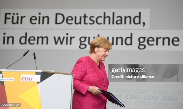 German Chancellor Angela Merkel arrives for an election campaign event of the CDU party in Heppenheim, Germany, 22 September 2017. The general...