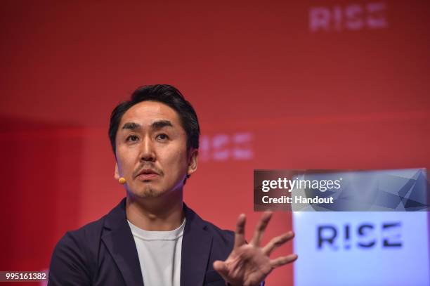 In this handout image provided by RISE, Takeshi Idezawa, CEO of LINE Corporation speaks on Centre Stage during day one of RISE 2018 at Hong Kong...
