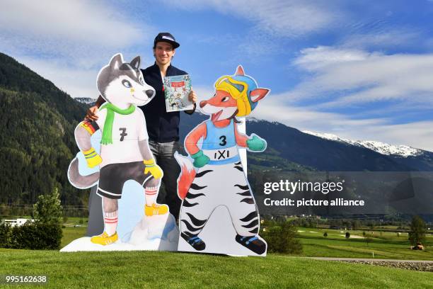 The German ski racer Fritz Dopfer presents a children's book during the Media day of the Deutschen Skiverbandes in Uderns im Zillertal, Austria, 22...