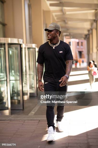 Corey Clement is seen on the street attending Men's New York Fashion Week wearing all-black with cap and gold chain on July 9, 2018 in New York City.