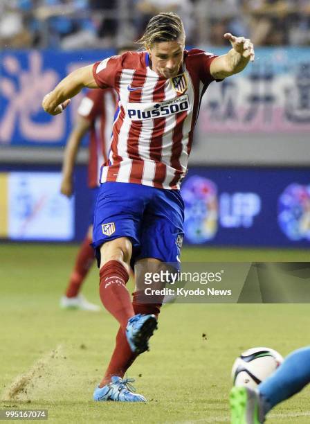 File photo taken on Aug. 1 shows Fernando Torres playing for Atletico Madrid in a friendly match against J-League first-division Sagan Tosu at Best...