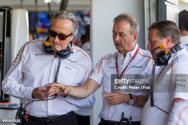 Mansour Ojjeh of Saudi Arabia with Jonathan Neale of Great Britain and Zak Brown of the USA all of Mclaren during practice for the Formula One Grand...