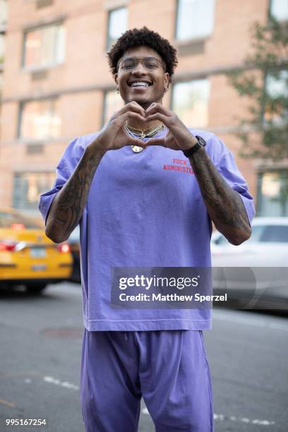 Kelly Oubre Jr. Is seen on the street attending Men's New York Fashion Week on July 9, 2018 in New York City.