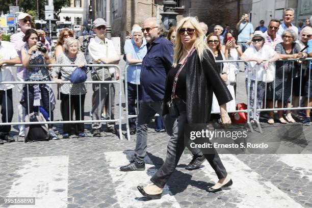 Mara Venier and Jerry Cala attend the funeral for Carlo Vanzina at Santa Maria degli Angeli on July 10, 2018 in Rome, Italy.