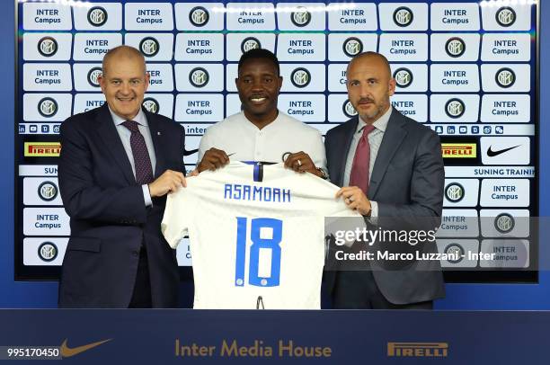 Chief Football Administrator of FC Internazionale Milano Giovanni Gardini, FC Internazionale new signing Kwadwo Asamoah and Sportif Director of FC...