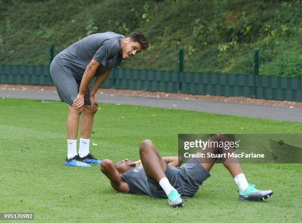 Konstantinos Mavropanos and Chuba Akpom of Arsenal after a training session at London Colney on July 10, 2018 in St Albans, England.