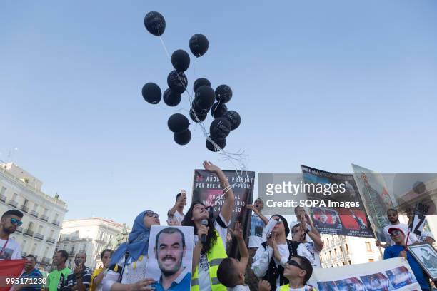 Balloons with the names of the political prisoners in the Rif are seen during the demonstration. Members of the Hirak movement in Madrid protest...