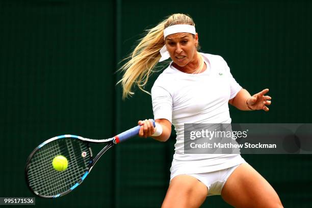 Dominika Cibulkova of Slovakia plays a forehand against Jelena Ostapenko of Latvia during their Ladies' Singles Quarter-Finals match on day eight of...