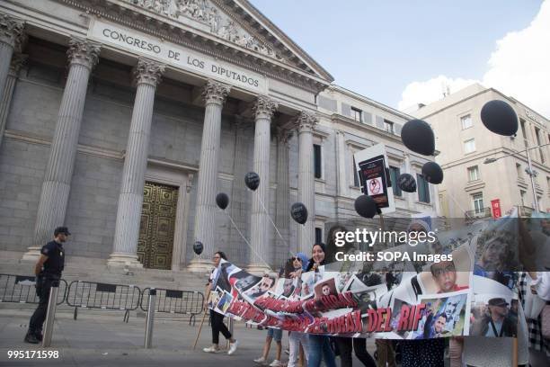 People seen protesting at the Spanish Congress of Deputies. Members of the Hirak movement in Madrid protest demanding the release of the political...