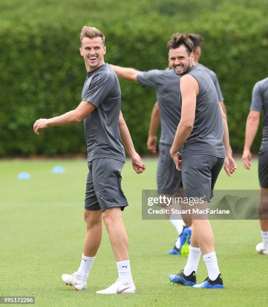 Rob Holding and Carl Jenkinson of Arsenal during a training session at London Colney on July 10, 2018 in St Albans, England.