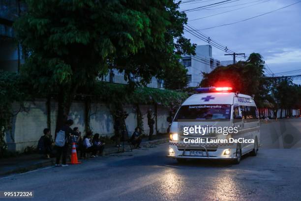 An ambulance transports some of the rescued schoolboys from a helipad to Chiangrai Prachanukroh Hospital on July 10, 2018 in Chiang Rai, Thailand....