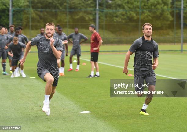 Calum Chambers and Aaron Ramsey of Arsenal during a training session at London Colney on July 10, 2018 in St Albans, England.