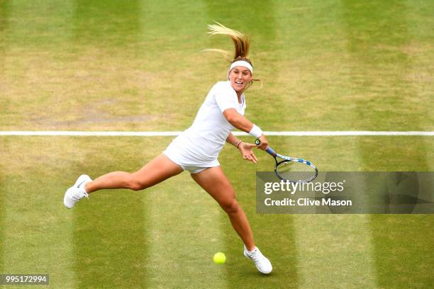 Dominika Cibulkova of Slovakia plays a forehand against Jelena Ostapenko of Latvia during their Ladies' Singles Quarter-Finals match on day eight of...