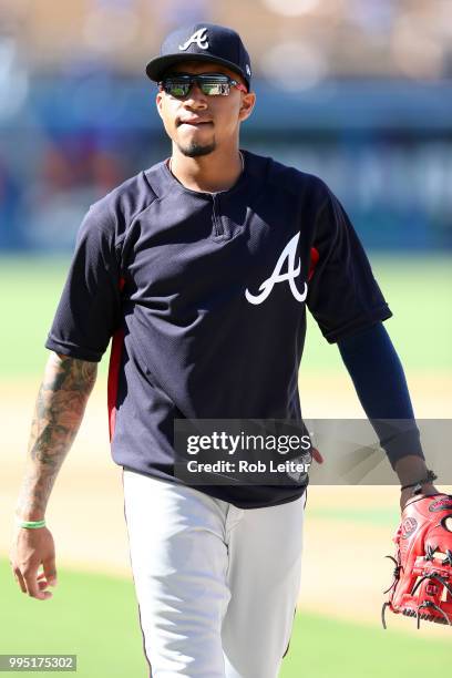 Johan Camargo of the Atlanta Braves looks on before the game against the Los Angeles Dodgers at Dodger Stadium on June 9, 2018 in Los Angeles,...
